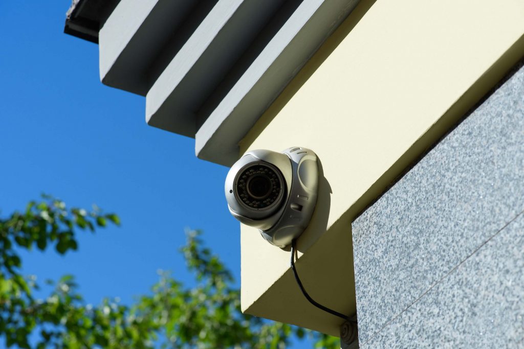 Security camera system mounted on a Miami Lakes, FL, business building exterior