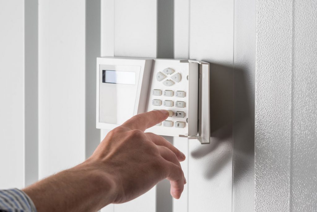 fingers using Alarm Systems, Security Camera Systems, and Fire Alarm Systems in Fort Lauderdale, FL